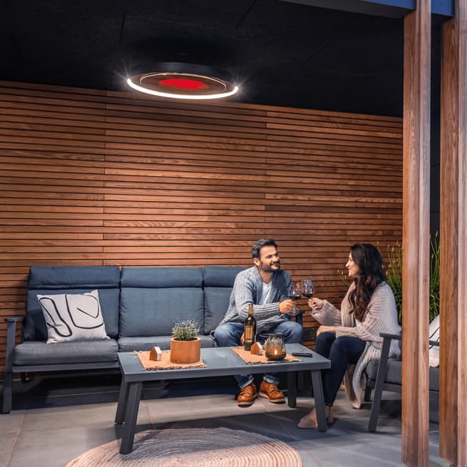 eclipse electric pendant heater over a couch